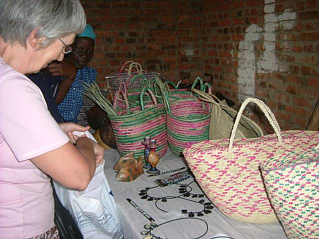 Jennifer buying from a crafts stall